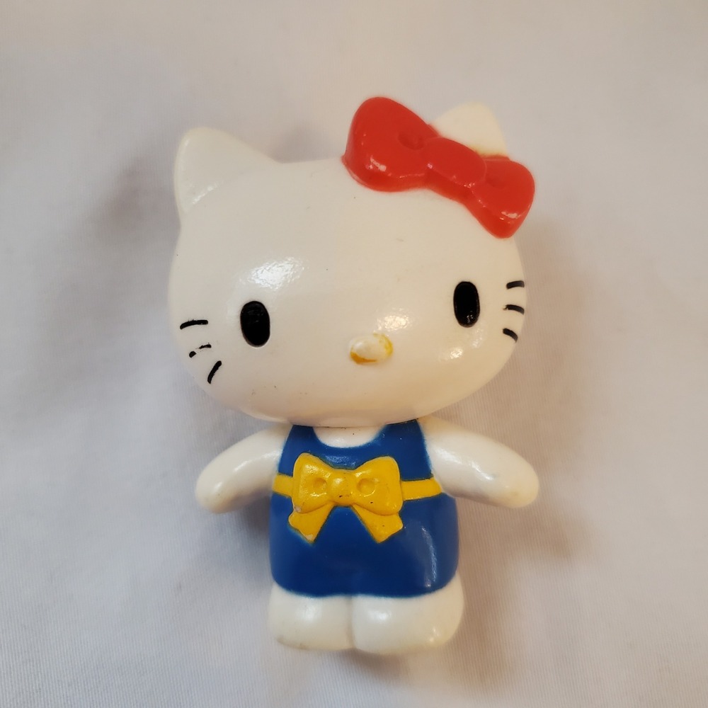Sanrio Hello Kitty Mini Figure Blue Overalls Red Bow Collectible Toy Figurine